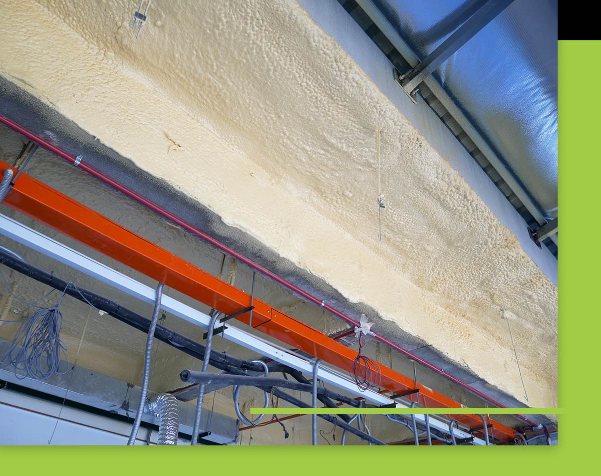 a commercial ceiling with complete spray foam insulation